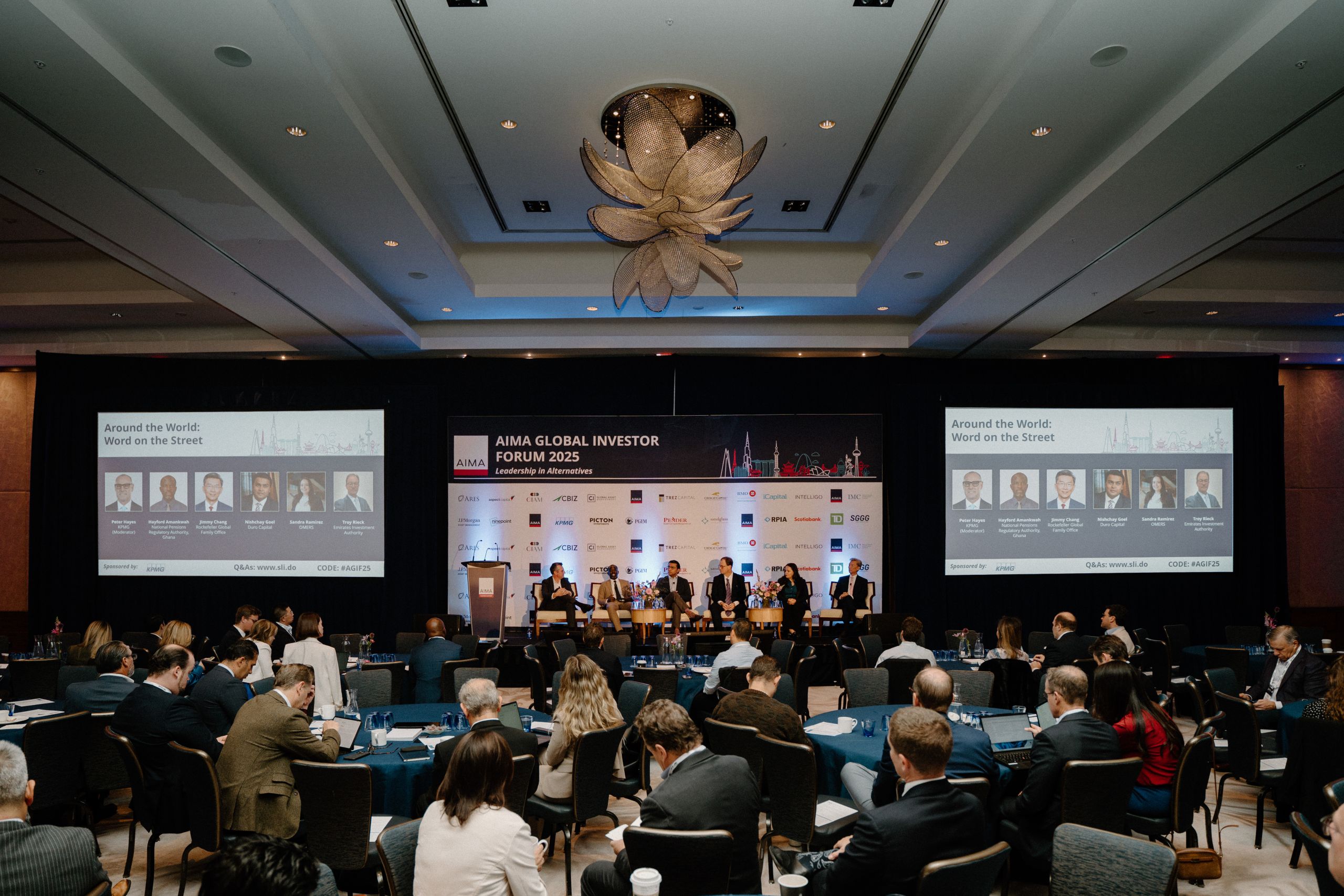 AIMA Global Investor Forum 2025 panel discussion on leadership in alternatives with panelists on stage and full audience at Toronto investment conference captured by Origin Films event photography